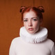 young woman with red space buns or odango hair style and white Elizabethan ruff collar young woman with red space buns or odango hair style and white Elizabethan ruff collar - PhotoDune Item for Sale