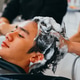 Barber washing head client in barbershop Barber washing head client in barbershop - PhotoDune Item for Sale