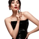 Spectacular beautiful woman in a fashionable leather dress with red lipstick and classic make-up Spectacular beautiful woman in a fashionable leather dress with red lipstick and classic make-up - PhotoDune Item for Sale