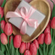 Gift Box on Heart Shaped Tray with Pink Tulips. Romantic Flatlay on Soft Pink Background Gift Box on Heart Shaped Tray with Pink Tulips. Romantic Flatlay on Soft Pink Background - PhotoDune Item for Sale
