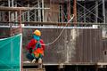 Construction workers fabricating steel reinforcement bar at the construction site Construction workers fabricating steel reinforcement bar at the construction site - PhotoDune Item for Sale