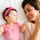 High angle of a cute baby and smiling mom High angle of a cute baby and smiling mom - PhotoDune Item for Sale