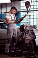 Auto mechanic inspecting motor car Auto mechanic inspecting motor car - PhotoDune Item for Sale