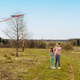 Children girls running flying colorful sky kite. Open field. Spring day. Family nature activity, fun Children girls running flying colorful sky kite. Open field. Spring day. Family nature activity, fun - PhotoDune Item for Sale