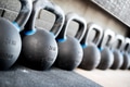 Row of kettlebell or girya weights in a gym Row of kettlebell or girya weights in a gym - PhotoDune Item for Sale