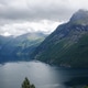 Enchanting beauty Geirangerfjord, stunning fjord in Norway. Fjord surrounded by majestic mountains Enchanting beauty Geirangerfjord, stunning fjord in Norway. Fjord surrounded by majestic mountains - PhotoDune Item for Sale