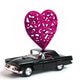 Retro black car with a lacy heart on the car roof. Delivery concept mood ideas surprise Retro black car with a lacy heart on the car roof. Delivery concept mood ideas surprise - PhotoDune Item for Sale