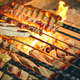 Shish kebab on skewers from different types of meat is fried on the grill Shish kebab on skewers from different types of meat is fried on the grill - PhotoDune Item for Sale