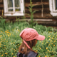 Summer time. Countryside. Child. Yellow flowers. Nature. Red baseball cap Summer time. Countryside. Child. Yellow flowers. Nature. Red baseball cap - PhotoDune Item for Sale