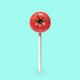 Fun candy tomato on a stick. Minimal pop art concept of healthy eating. Fun candy tomato on a stick. Minimal pop art concept of healthy eating. - PhotoDune Item for Sale