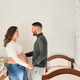 Pregnant couple admiring baby nursery, anticipating family future Pregnant couple admiring baby nursery, anticipating family future - PhotoDune Item for Sale