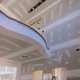 Drywall installation in modern home with curved staircase high ceiling Drywall installation in modern home with curved staircase high ceiling - PhotoDune Item for Sale