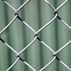 Chain Link Fence and Green Background Chain Link Fence and Green Background - PhotoDune Item for Sale