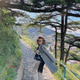 A girl walking along a path with top view of Tbilisi.Tourism and travelling. Sunny weather, trees. A girl walking along a path with top view of Tbilisi.Tourism and travelling. Sunny weather, trees. - PhotoDune Item for Sale