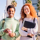 two young students smiling happy looking at camera two young students smiling happy looking at camera - PhotoDune Item for Sale