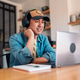 Chinese man during an online meeting at home Chinese man during an online meeting at home - PhotoDune Item for Sale