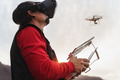 Male professional pilot doing fpv experience with virtual reality glasses and drone Male professional pilot doing fpv experience with virtual reality glasses and drone - PhotoDune Item for Sale