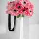 Pink anemone flowers bouquet in a white gift bag Pink anemone flowers bouquet in a white gift bag - PhotoDune Item for Sale