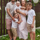 big friendly young family. mom dad and three sons.beautiful young mother in a summer dress and three big friendly young family. mom dad and three sons.beautiful young mother in a summer dress and three - PhotoDune Item for Sale