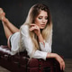 Sensuality and femininity. Portrait of beautiful young blonde girl lying on the sofa Sensuality and femininity. Portrait of beautiful young blonde girl lying on the sofa - PhotoDune Item for Sale