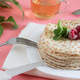 Fried pancakes close-up on a white plate, pancakes with raspberries, tea cerimonia Fried pancakes close-up on a white plate, pancakes with raspberries, tea cerimonia - PhotoDune Item for Sale