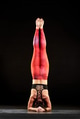 Woman doing headstand during a yoga workout Woman doing headstand during a yoga workout - PhotoDune Item for Sale
