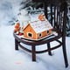 Gingerbread house and holiday decoration on chair in snow winter outdoor background Gingerbread house and holiday decoration on chair in snow winter outdoor background - PhotoDune Item for Sale
