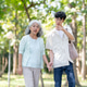 Young man grandson pointing as he holding hand and walking with old woman grandmother in garden park Young man grandson pointing as he holding hand and walking with old woman grandmother in garden park - PhotoDune Item for Sale