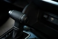 Close-up of automatic gearbox handle in the modern car Close-up of automatic gearbox handle in the modern car - PhotoDune Item for Sale