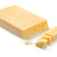 Extra mature english traditional cheddar cheese and pieces on white background close up Extra mature english traditional cheddar cheese and pieces on white background close up - PhotoDune Item for Sale