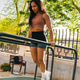 A Strong Hispanic Woman Doing Exercise In The Park A Strong Hispanic Woman Doing Exercise In The Park - PhotoDune Item for Sale