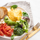 French omelet, avocado, tomatoes, avocado, and cheese on plate. French omelet, avocado, tomatoes, avocado, and cheese on plate. - PhotoDune Item for Sale