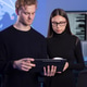 Two cybersecurity professionals analyzing data in a secure operations center Two cybersecurity professionals analyzing data in a secure operations center - PhotoDune Item for Sale