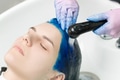 Hairdresser Washes Client's Head with Sapphire Hair Color After Hair Coloring Process Hairdresser Washes Client's Head with Sapphire Hair Color After Hair Coloring Process - PhotoDune Item for Sale