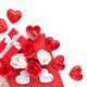 Red gift box with roses, ribbon and hearts on white and red background Red gift box with roses, ribbon and hearts on white and red background - PhotoDune Item for Sale