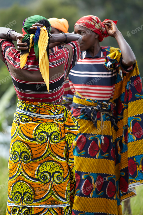 Two women in traditional African attire enjoying the outdoors together. Stock Photo by Image-Source Two women in traditional African attire enjoying the outdoors together. Stock Photo by Image-Source