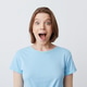 Portrait of cheerful attractive young woman in t-shirt Portrait of cheerful attractive young woman in t-shirt - PhotoDune Item for Sale