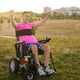 Man in wheelchair feeling proud, joyful, and motivated Man in wheelchair feeling proud, joyful, and motivated - PhotoDune Item for Sale
