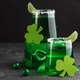 Green Cocktails with Shamrocks and Gifts. Festive St. Patricks Day Celebration Still Life Green Cocktails with Shamrocks and Gifts. Festive St. Patricks Day Celebration Still Life - PhotoDune Item for Sale