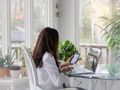 Latino Hispanic business woman working on modern well lighted natural workspace using technology Latino Hispanic business woman working on modern well lighted natural workspace using technology - PhotoDune Item for Sale