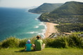 Father and daughter enjoy scenic view from Stanwell tops. New South Wales, Australia Father and daughter enjoy scenic view from Stanwell tops. New South Wales, Australia - PhotoDune Item for Sale