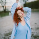 Redhead woman enjoying freedom and fresh air Redhead woman enjoying freedom and fresh air - PhotoDune Item for Sale