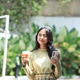 Young Asian Student Standing Holding Coffee and Mobile Phone Young Asian Student Standing Holding Coffee and Mobile Phone - PhotoDune Item for Sale