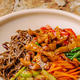 Tasty soba noodles with veggies and chicken at a restaurant Tasty soba noodles with veggies and chicken at a restaurant - PhotoDune Item for Sale