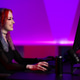 Young woman gaming on computer with vibrant and colorful lighting settings Young woman gaming on computer with vibrant and colorful lighting settings - PhotoDune Item for Sale