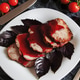 Juicy steak well done roast pork with red sauce and Basil leaves on a white plate Juicy steak well done roast pork with red sauce and Basil leaves on a white plate - PhotoDune Item for Sale
