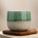 Japanese Style Ceramic Tea Cup on Wooden Coaster with Soft Natural Light Japanese Style Ceramic Tea Cup on Wooden Coaster with Soft Natural Light - PhotoDune Item for Sale