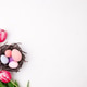 Colorful Easter eggs in decorative nest and tulip flowers on light background Colorful Easter eggs in decorative nest and tulip flowers on light background - PhotoDune Item for Sale