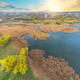 View of river and green bank from height at sunset View of river and green bank from height at sunset - PhotoDune Item for Sale