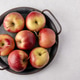 Fresh Red Apples in a Rustic Metal Tray Fresh Red Apples in a Rustic Metal Tray - PhotoDune Item for Sale